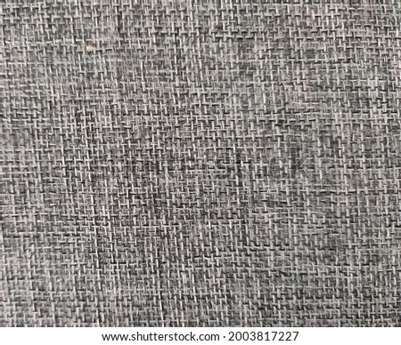 Grey natural linen texture as background. Grey fabric background. Linen fabric background.