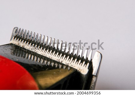 closeup photo of hair clipper blades