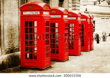 vintage style picture of British phone boxes in London
