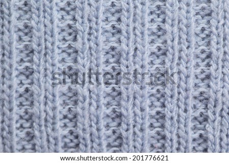 Abstract tender light blue knitted background texture