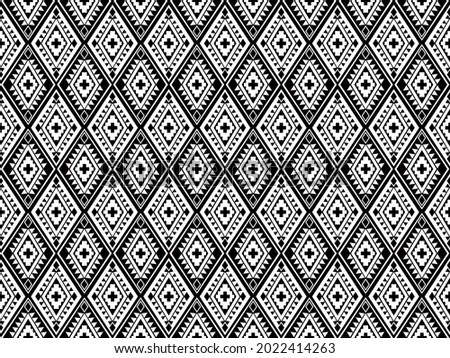 Geometric ethnic pattern design for background or wallpaper and clothing.
