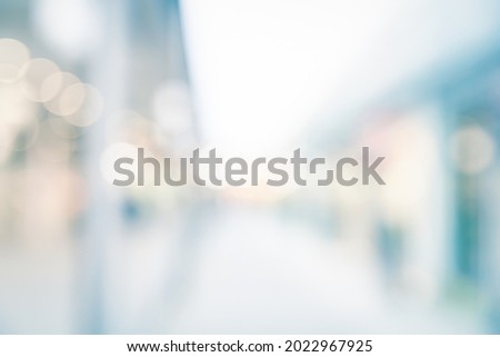 BLURRED OFFICE BACKGROUND, MODERN BUSINESS STORE, CITY INTERIOR WITH BOKEH LIGHTS CORRIODR