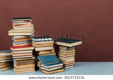 Stacks of Books for College School Library Training Brown Background