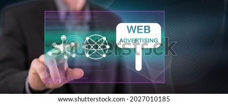 Man touching a web advertising concept on a touch screen with his finger