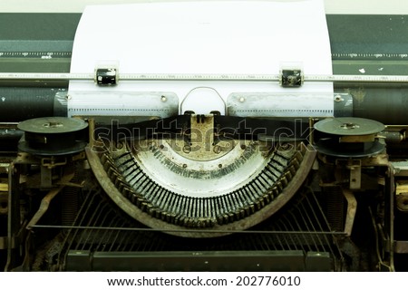 old typewriter with paper