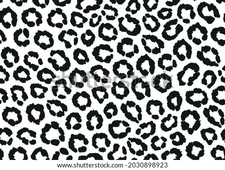 Leopard skin fashion print for clothes, textile, fabric, wallpaper. Animal skin seamless pattern in black and white.