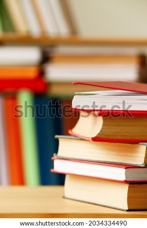 Stack of books in room, closeup