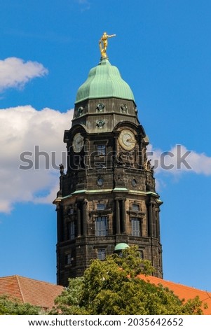 Town hall tower in the city center of Dresden with the golden town hall man on top