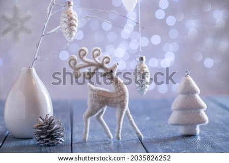 Christmas card with a garland and Christmas decorations. Copy space.