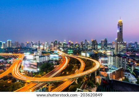 Bangkok cityscape at night with express way