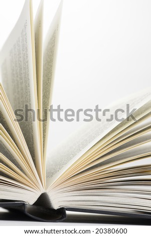 book pages on white background close-up