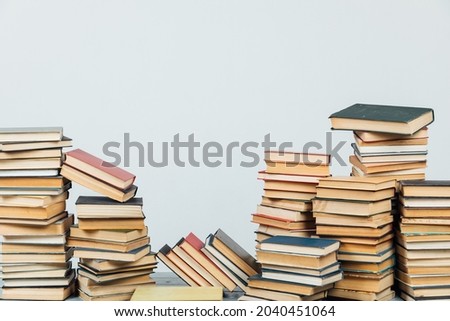 Stacks of books for teaching knowledge library university school white background