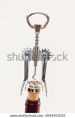 metal corkscrew for opening bottles and wine corks