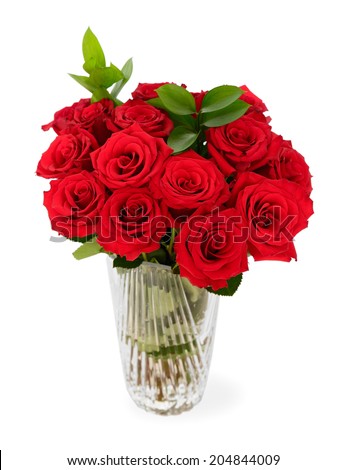 A bouquet of red roses in a glass vase. isolated on a white background. 