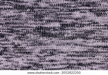 Abstract knitted gray black white background