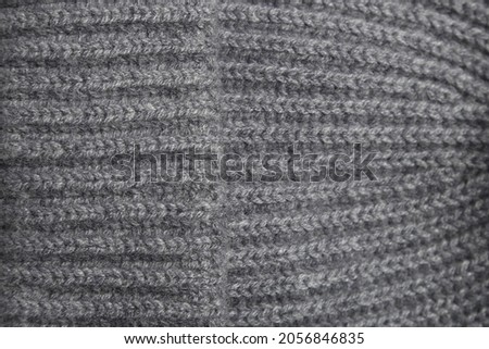Gray texture wool close-up, woven cloth, knitted fabric