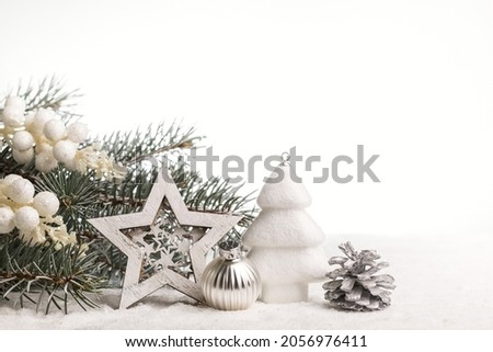 Christmas card with fir branches and Christmas decorations. Copy space.