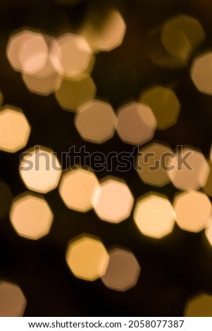 Abstract defocused bokeh background with Christmas lights. Overlay golden bokeh light texture