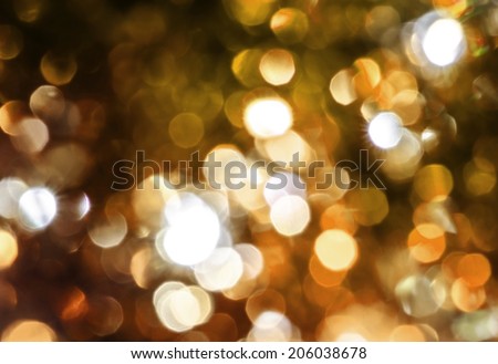 Blur golden circle lights as christmas background. 