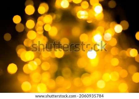 Blurred lights photo with. Abstract festive holidays background, bokeh effect. Christmas lights and garland decorations.
