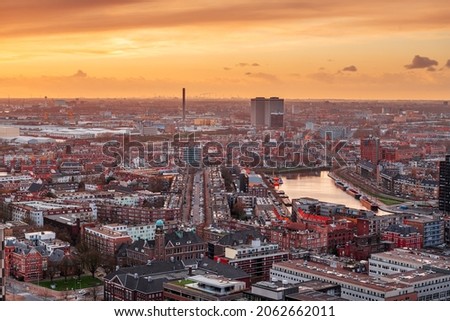 Rotterdam, Netherlands, cityscape towards the borough of Delfshaven at twilight.