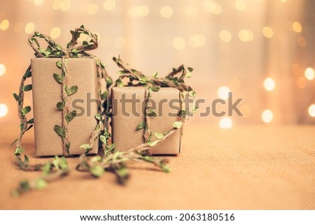 gift box, present on the table and light of bokeh background. Valentine's Day, Christmas, Birth day, New year and Anniversary concept.