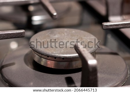 The gas burner on the kitchen stove is turned off. The crisis in the fuel sector.