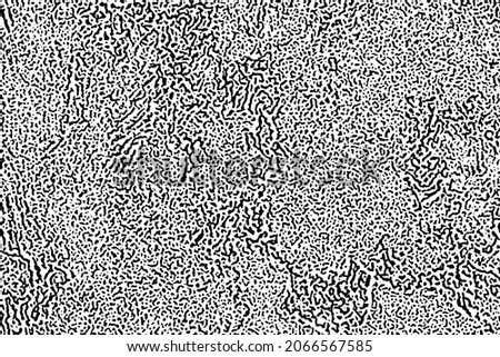 Grunge texture of natural stone surface. Monochrome background of a mottled wall with chaotic spots, streaks, noise and graininess. Overlay template. Vector illustration