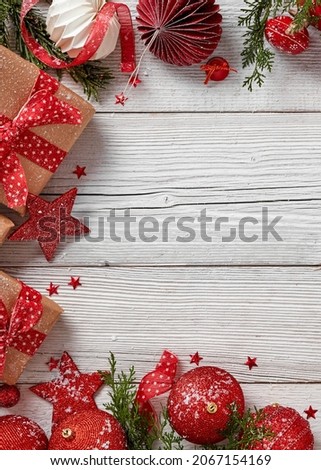 Christmas decoration and presents on wooden table