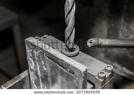 Drill close-up for metal and iron drilling industrial work tool.