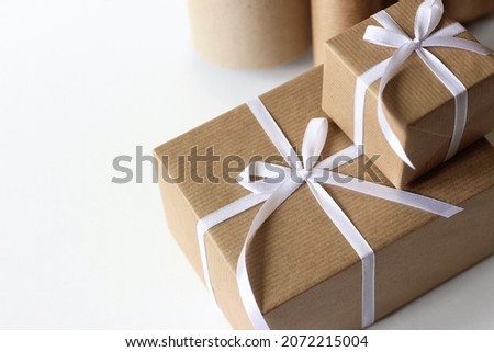 Wrapped and Ribbon Bow Decorated Christmas Gifts. Holidays Packaging Design.