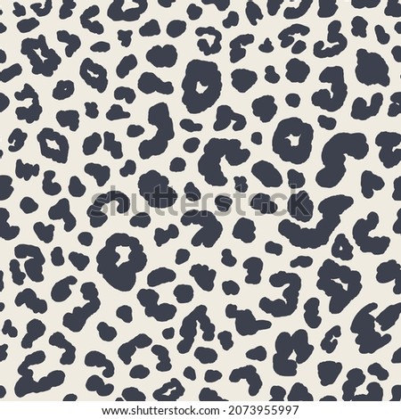 Animal skin seamless repeat pattern. Random placed, vector spot leopard print all over surface print on beige white background.