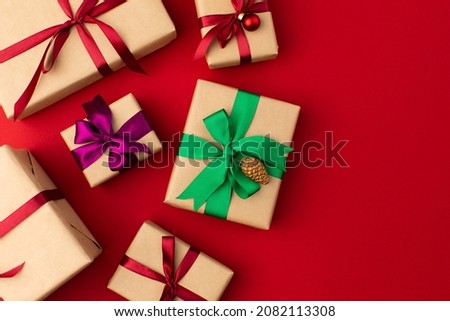 Gift boxes wrapped in craft paper with ribbon and bow