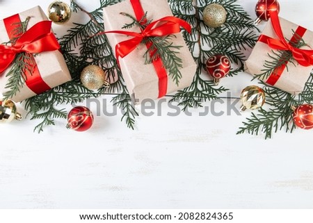 Christmas gifts with red ribbon on white background. Place for text.