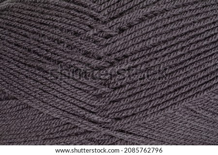 Close up texture of woolen, cotton yarn. Hobby, knitting, diy background