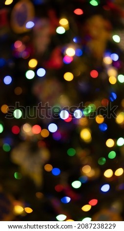 Multicolor Christmas bokeh abstract winter background. Circular points. Colorful.
