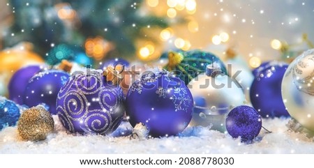 Merry Christmas Holidays greeting card background. very peri, Color of the year, 2022, blue, purple, Selective focus. nature.