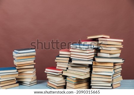 educational books for training in the college library on a brown background