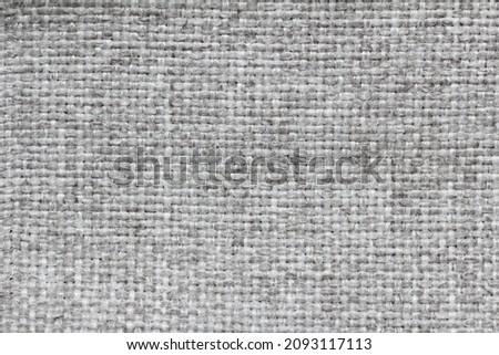 the texture of the furniture fabric is of the jacquard type