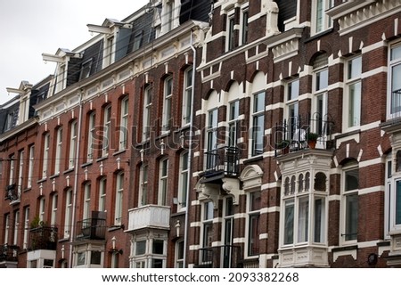 Typical facade of a Dutch style buildings in Amsterdam Netherlands