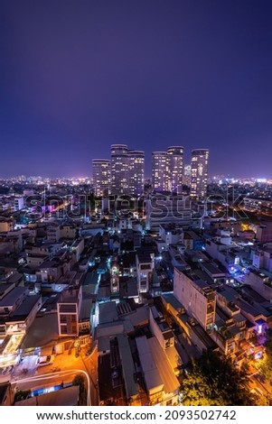 Nightscape of Ho Chi Minh City, it is the most populous city in Vietnam. Its also known by its former name of Saigon. Saigon skyline. View of City Garden Boulevard Tower (Chung cu City Garden)