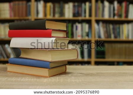 Stack of book on table in library