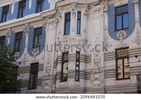 Vintage Art Nouveau Buildings in Riga Latvia decorated with symbols for prosperity and protection