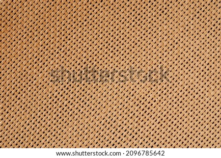 Close-up of a decorative napkin textile background. Diagonal line shapes