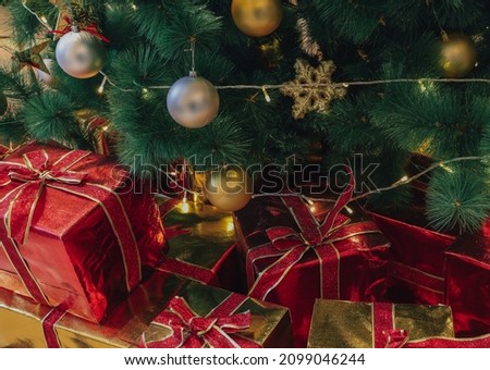 Wrapped Christmas Gifts Under Christmas Tree