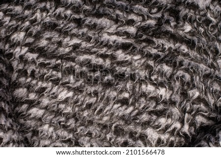 Detailed image of crumpled fabric. Image for the background. Soft shadows. Close-up shot of fabric texture.