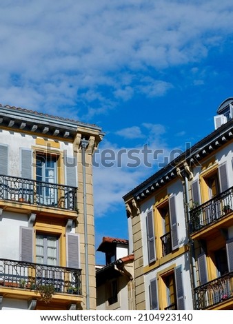 Colourful antique facades downtown in San Sebastian, Basque country, Spain. Vertical photo