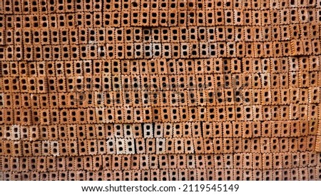 Red brick wall surface with rough texture. Red brick wall background.
