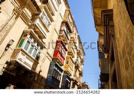 Narrow streets with colourful window boxes in Valetta, Malta