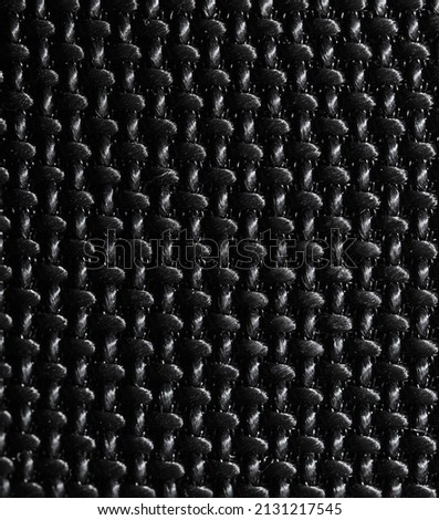 Black fabric as an abstract background. Texture